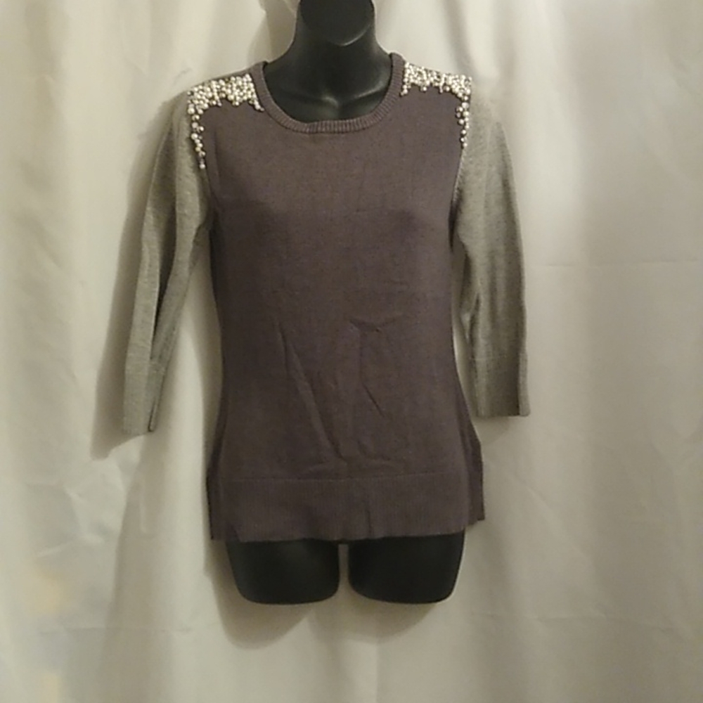 A. Byer grey shirt with faux pearls on the shoulder and quarter sleeves